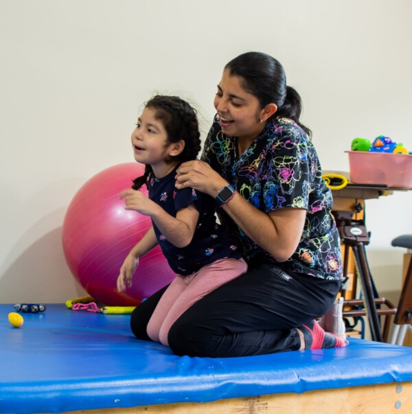 Emma receives therapy with Adela
